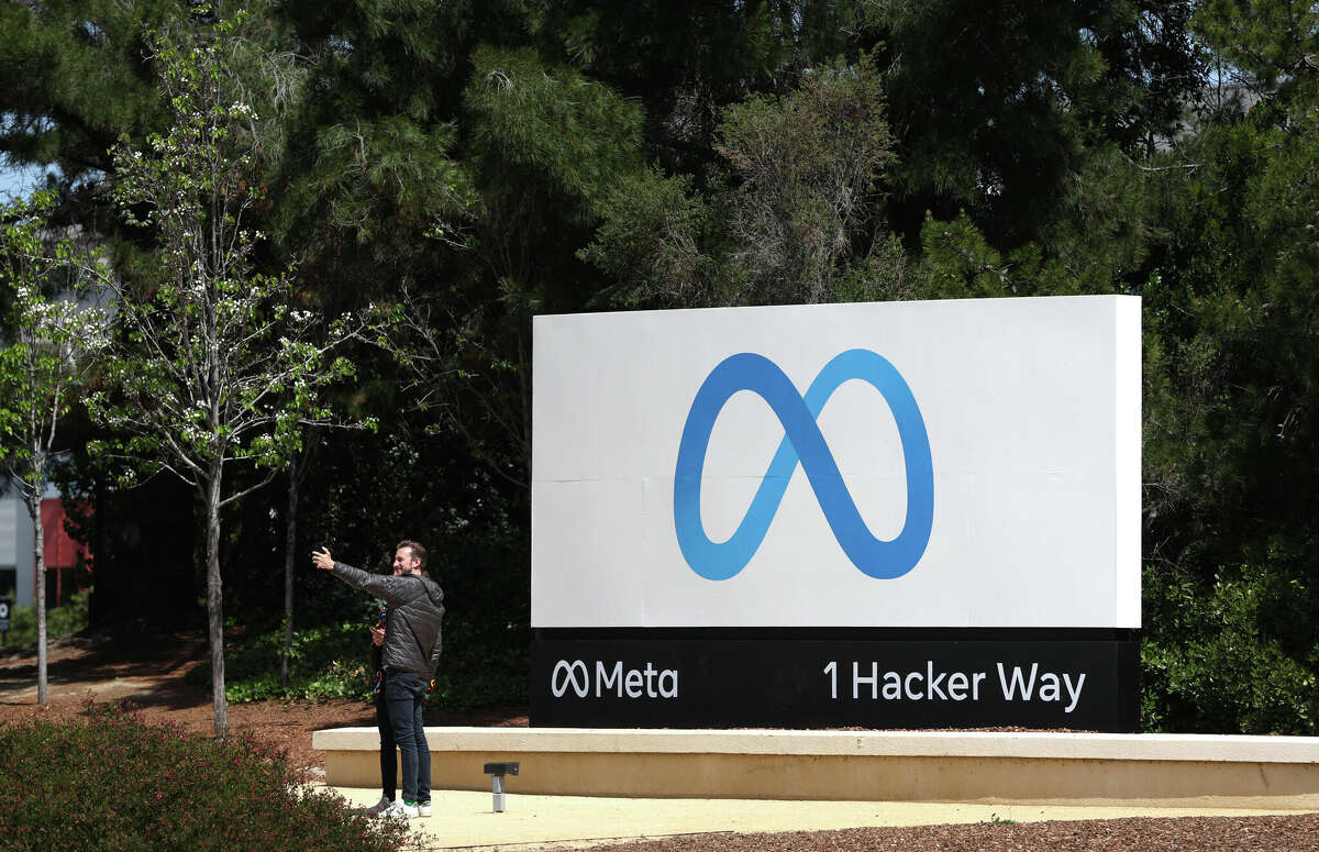 meta headquarters sign efficiency layoff